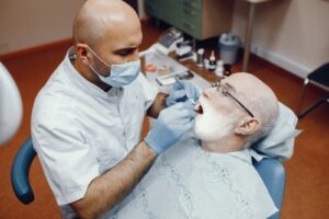 The Benefits of Full-Mouth Dental Implants Over Traditional Dentures